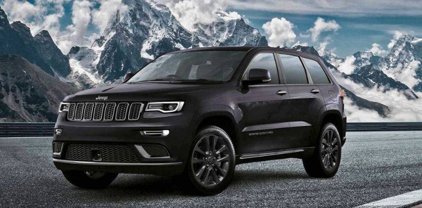 A torn paper reveals 2021 Jeep Grand Cherokee interior design