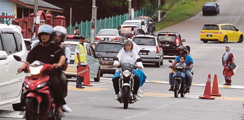 Malaysian motorcyclists restrictions
