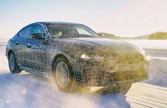 BMW i4 electric coupé teased ahead of its official debut in 2021 