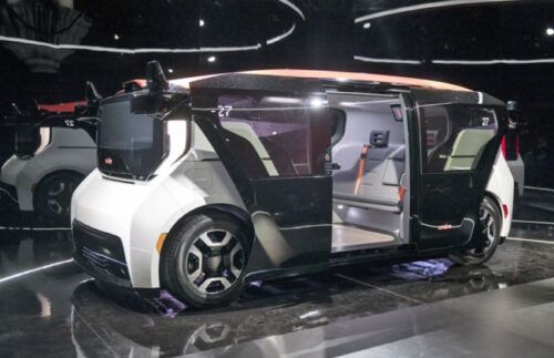 General Motors autonomous car has seats but no steering wheel, pedals