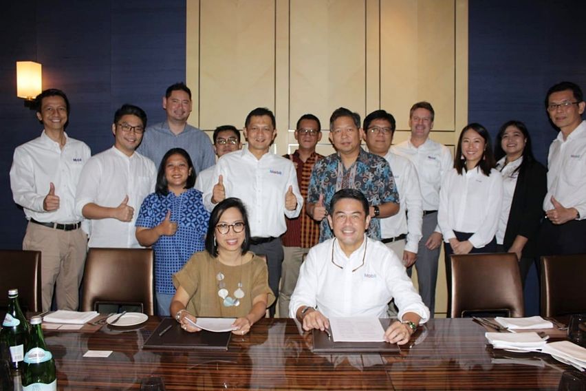 Kerja sama Grab dan ExxonMobil