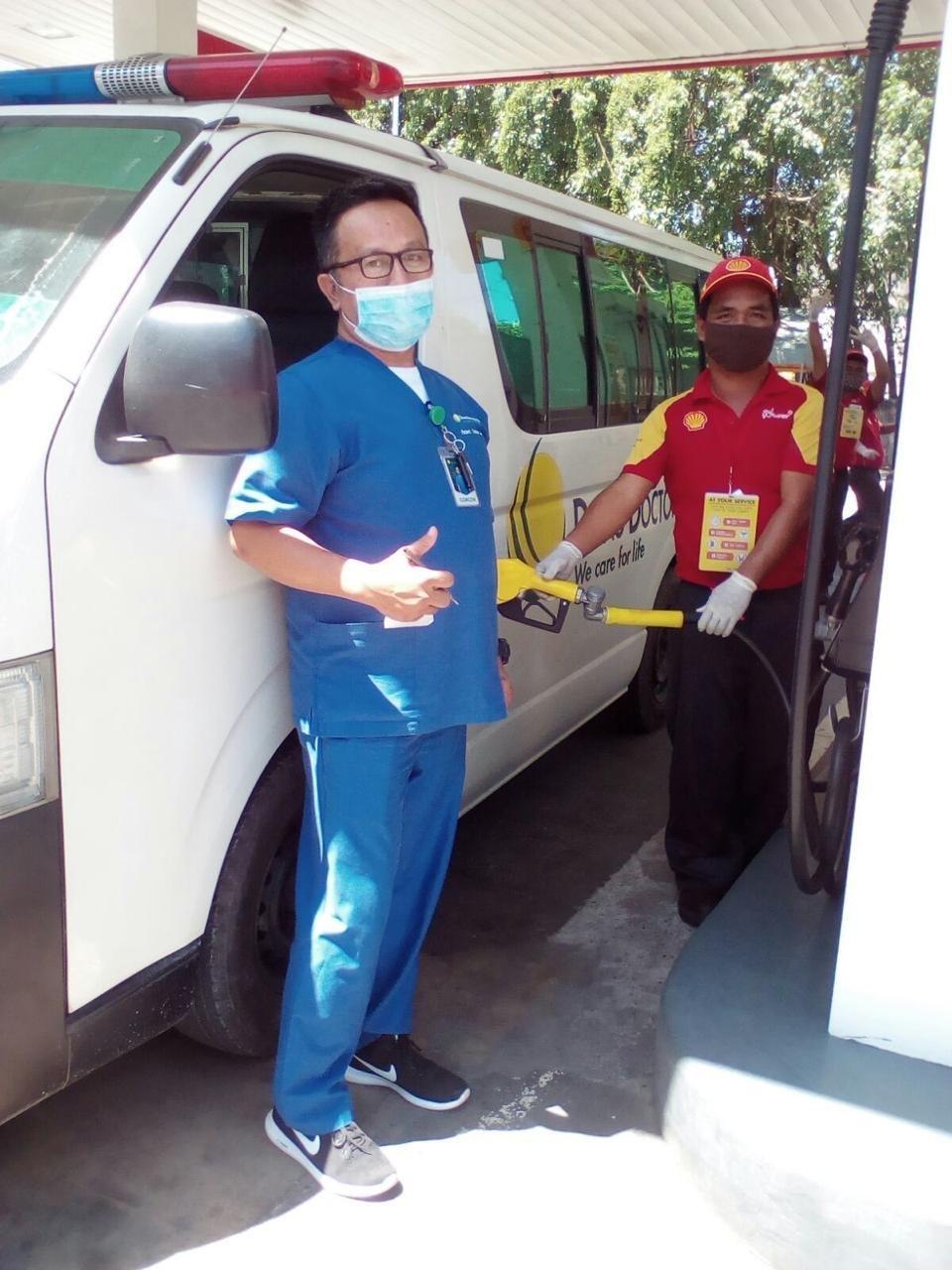 Ambulance Gassing Up at Shell