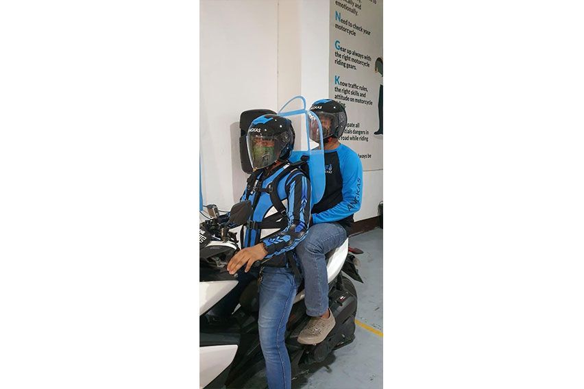Gov't approves Angkas passenger shield for moto back riders