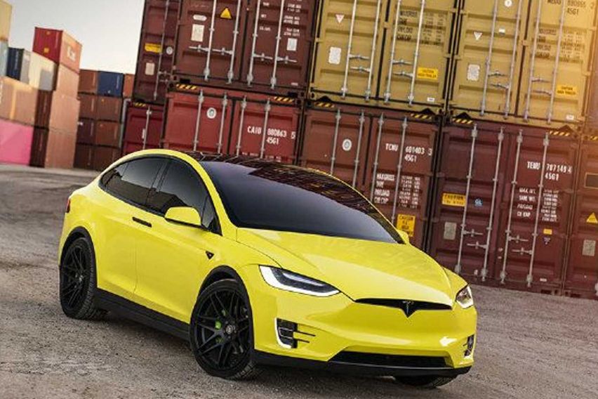 Tesla yellow car-wrapping