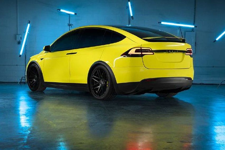Tesla yellow car-wrapping
