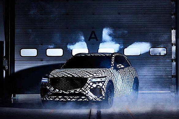  Genesis teases market with camouflaged GV70 luxury SUV