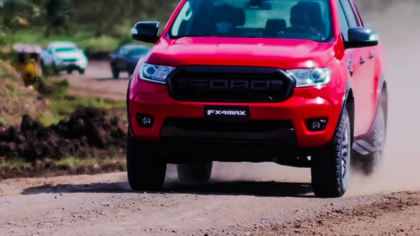2014 Ford Ranger FX4 MAX Red on dirt road