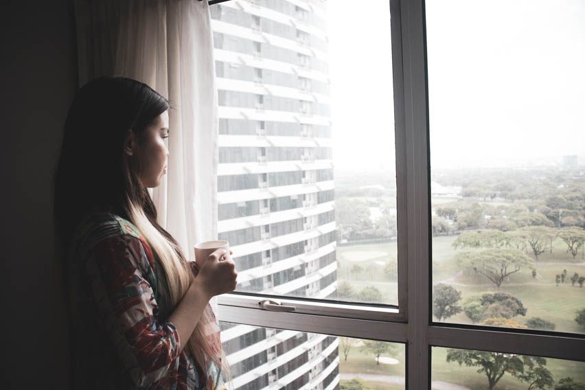 Model looking out window 2