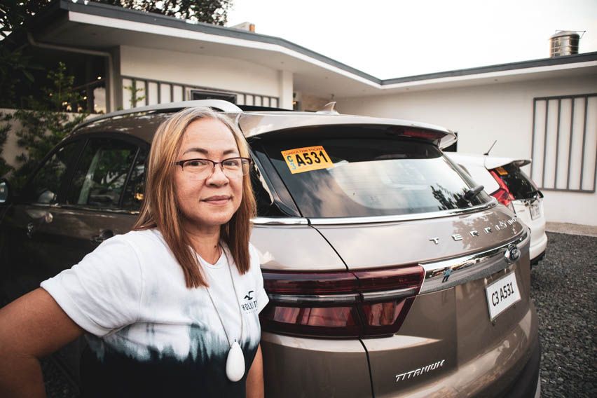 Mom posing next to Territory