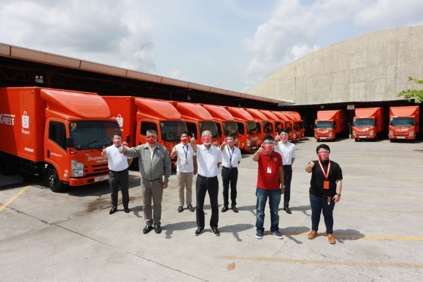 Shopee Xpress' Isuzu NMR85H Trucks