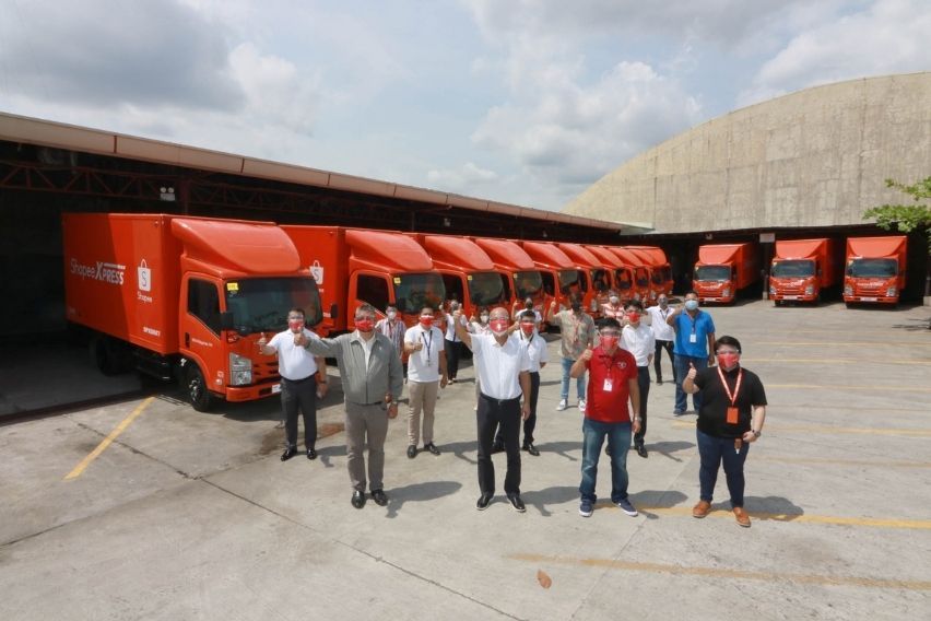 Shopee Xpress' Isuzu NMR85H Trucks