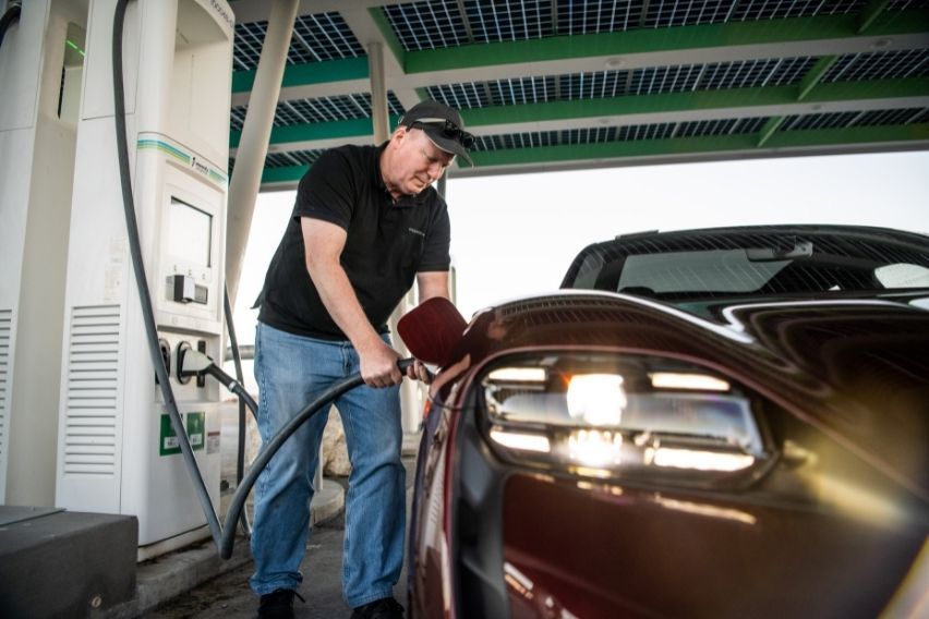 Guinness World Records titleholder Wayne Gerdes with Porsche Taycan