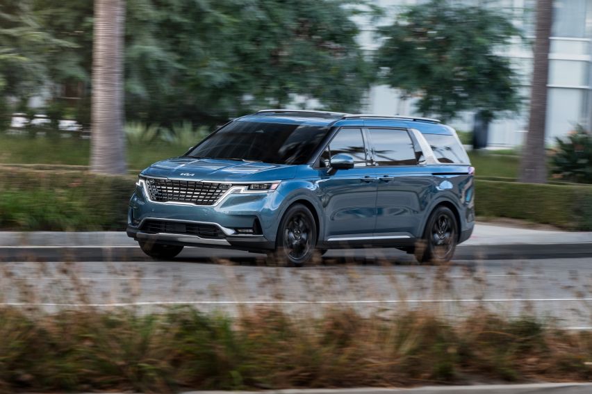 2022 Carnival on the road behind grass