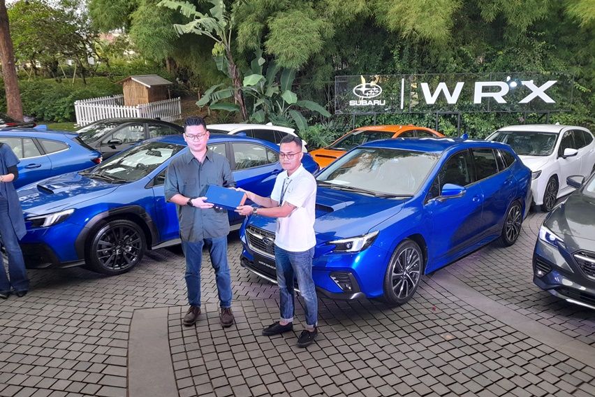 hand over Subaru WRX