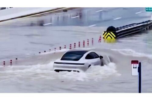 Porsche Taycan EV conquers flooded street in Dubai