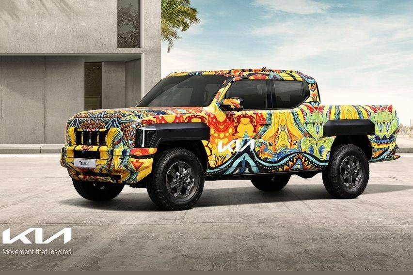 Kia Tasman teased in a unique camouflage wrap; global debut in 2025