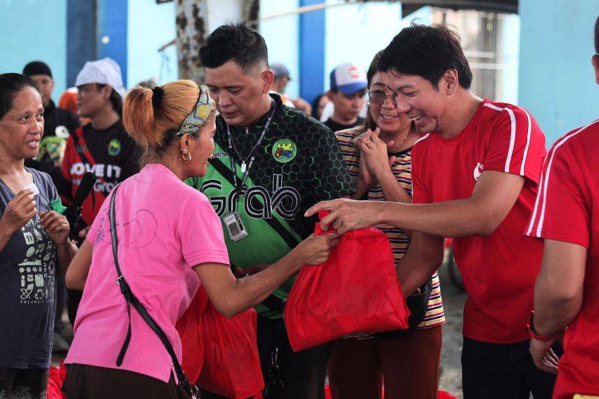 Grab PH, Move It partners hand over goods to Typhoon Kristine-affected areas