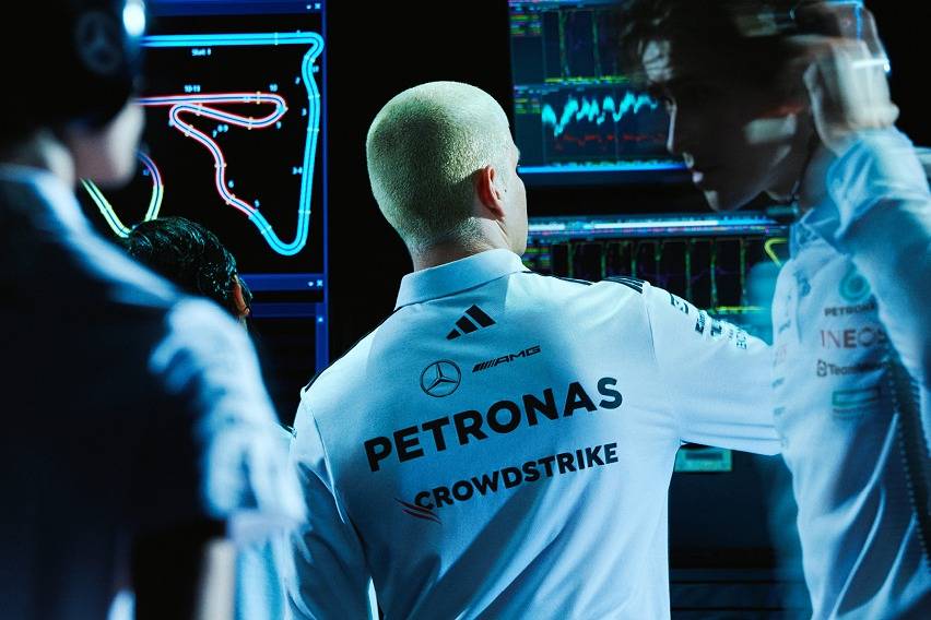 Mercedes-AMG Petronas F1 x Adidas Backshot of engineer sporting the teamwear