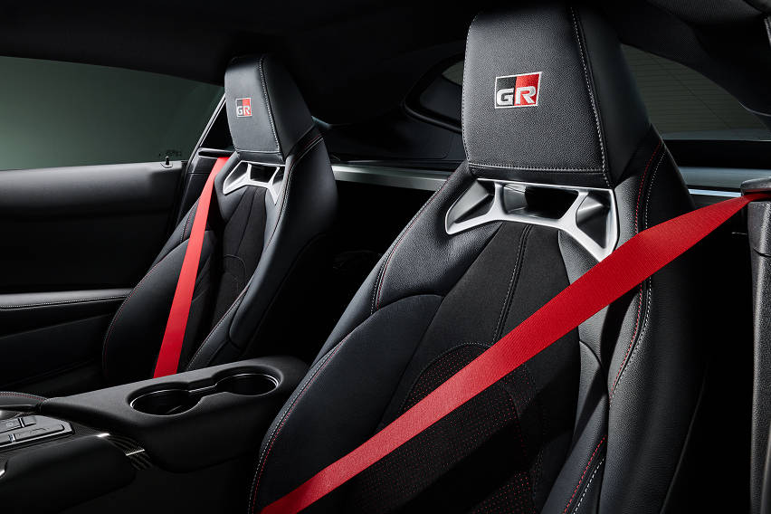 GR Supra Track Edition interior red sealt belts, alcantara lined
