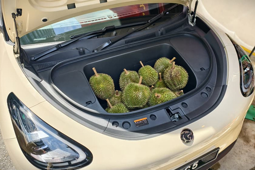 Proton emas5 frunk view filled with durian