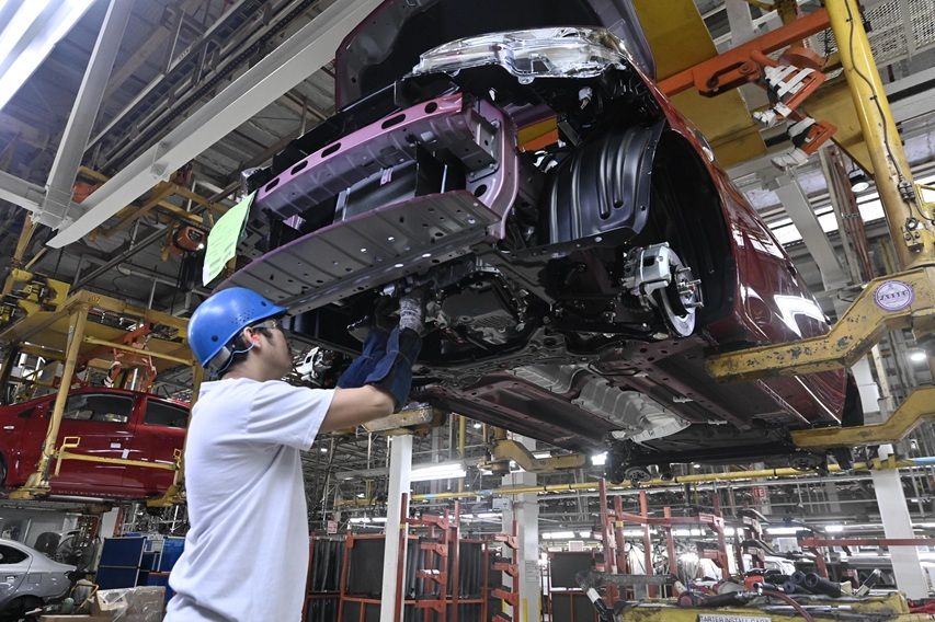 Men at work in the MMPC Manufacturing Plant