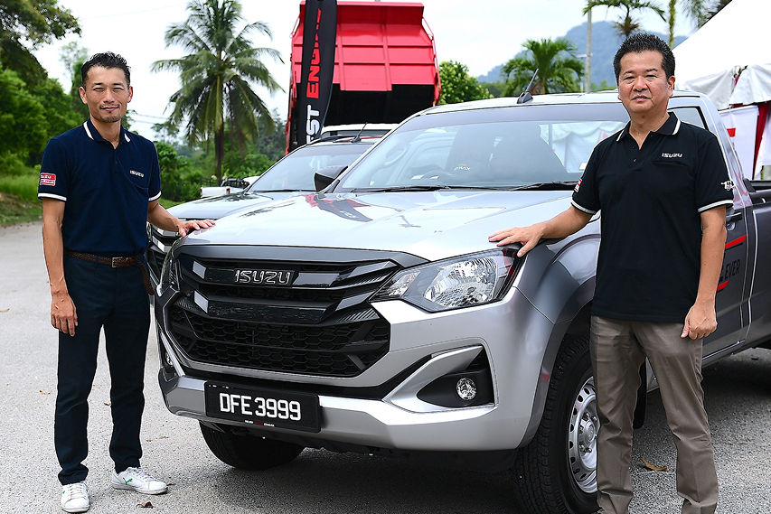 Kenichi Kudo and Tomoyuki Yamaguchi with the Isuzu D-Max Single Cab Auto