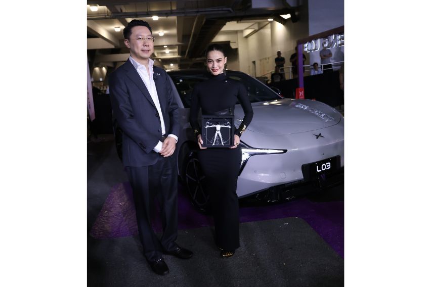 Anne Curtis with James Wu, Vice President of XPENG